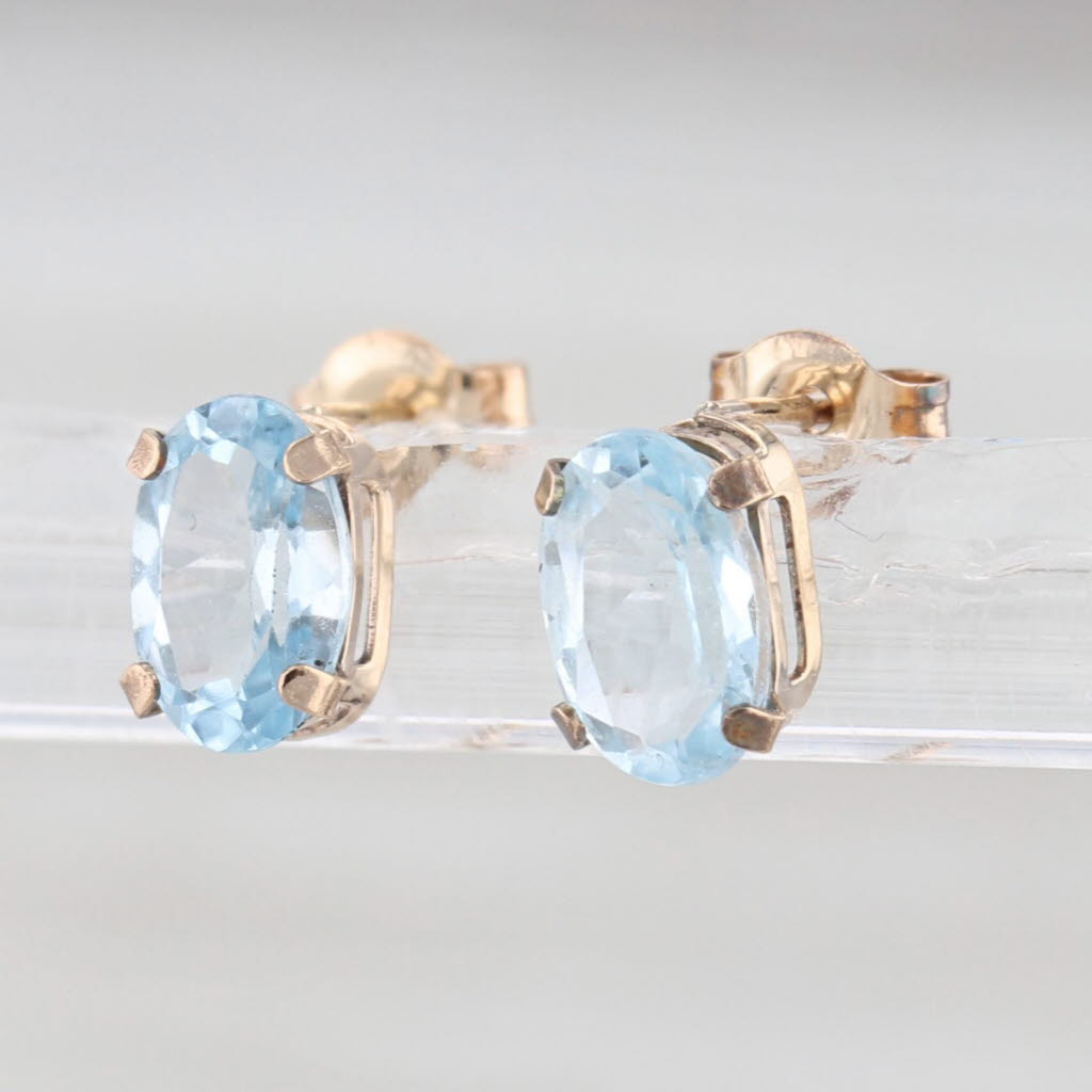 1.18ctw Oval Blue Topaz Stud Earrings 10k Yellow Gold Solitaire Studs