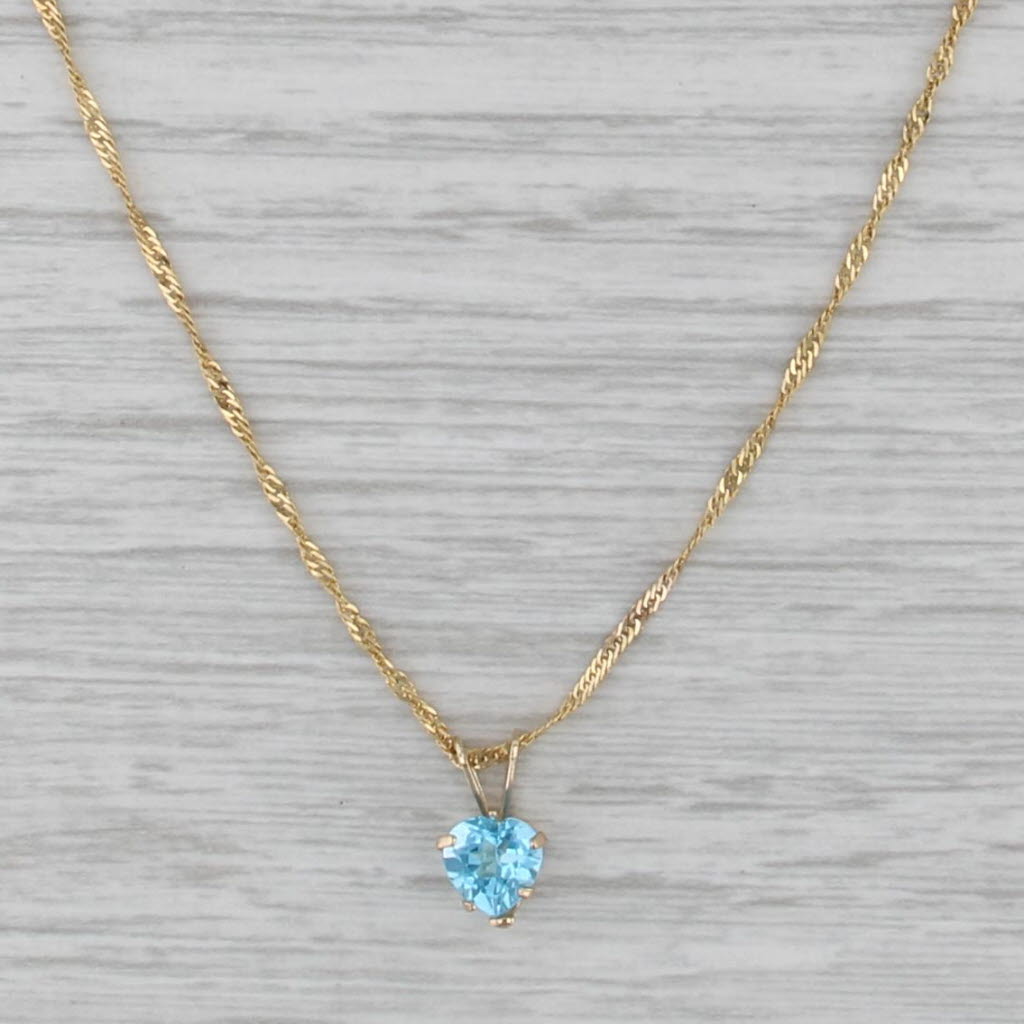 0.95ct Blue Topaz Heart Pendant Necklace 14k Yellow Gold 18" Singapore Chain