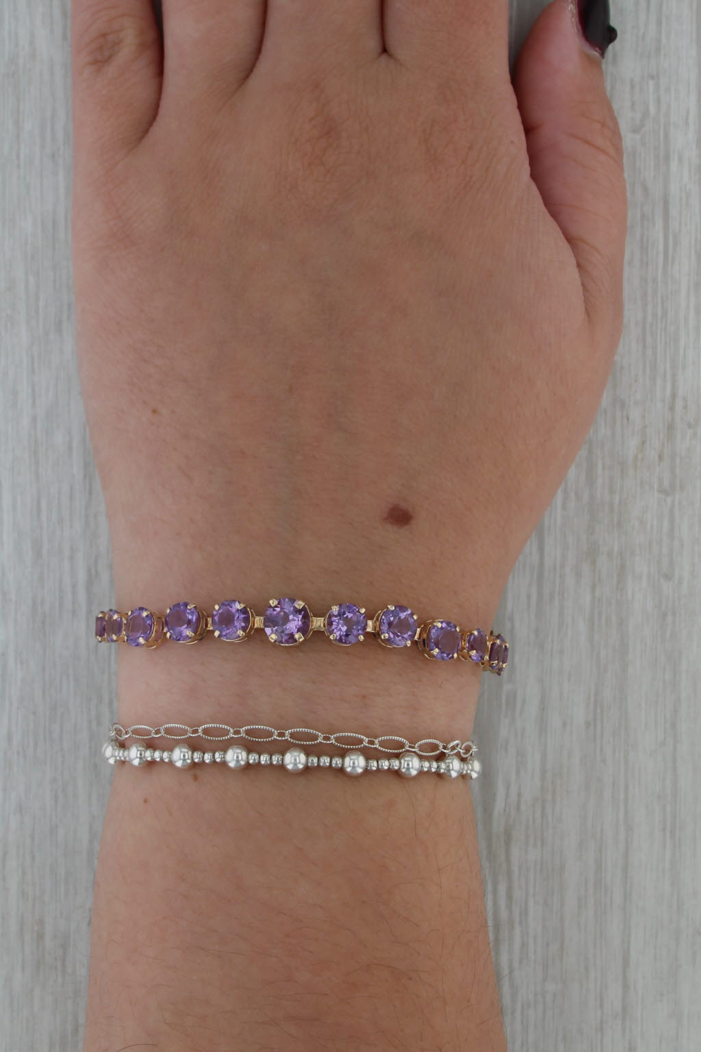 12ctw Tapering Amethyst Tennis Bracelet 14k Yellow Gold 7.25" 6.4mm