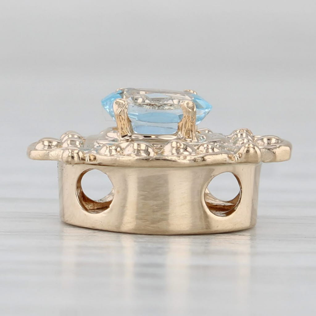 Light Gray Vintage Old Victoria 0.54ct Blue Topaz Solitaire Slide Bracelet Charm 14k Gold