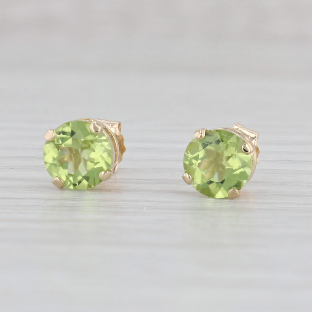 Light Gray 1.90ctw Round Peridot Stud Earrings 14k Yellow Gold August Birthstone