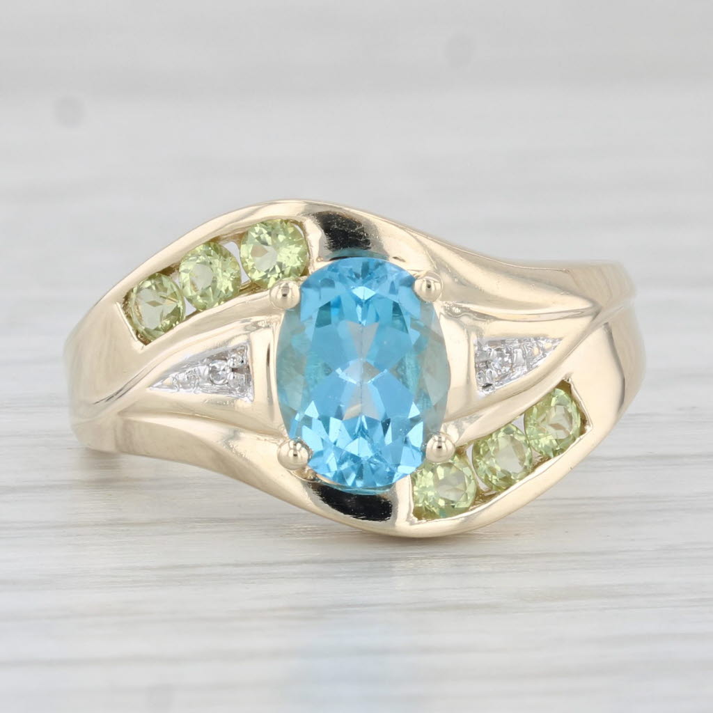 Light Gray 1.94ctw Oval Blue Topaz Peridot Diamond Ring 10k Yellow Gold Size 7.25