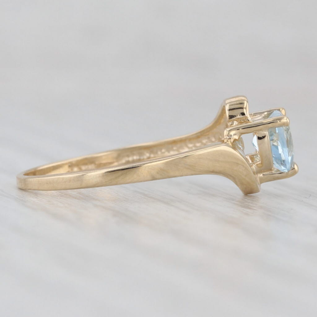 Light Gray 0.38ct Aquamarine Heart Bypass Ring 10k Yellow Gold March Birthstone Size 6.5