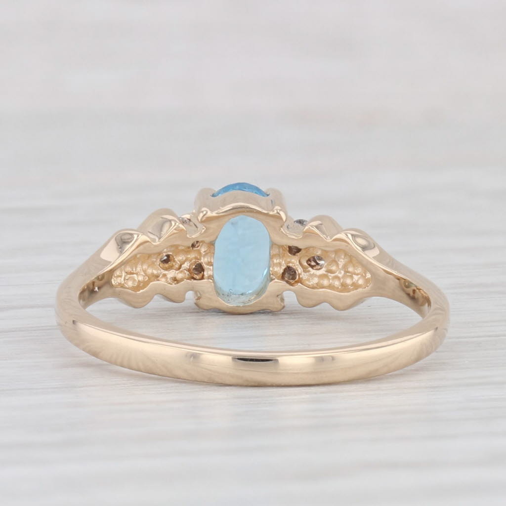 Light Gray 0.60ctw Oval Blue Topaz Diamond Ring 14k Yellow Gold Size 6.25