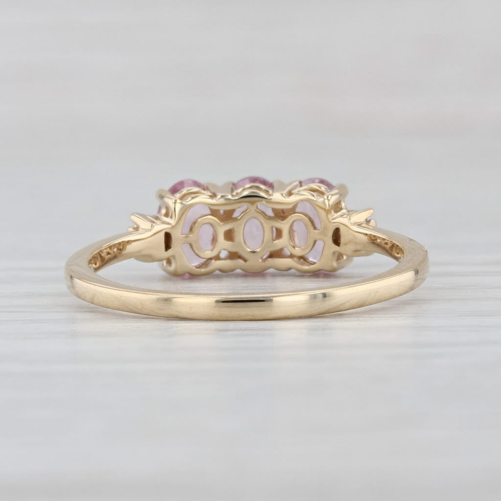 1.54ctw 3-Stone Pink Spinel Ring 10k Yellow Gold Size 9.25 Diamond Accents