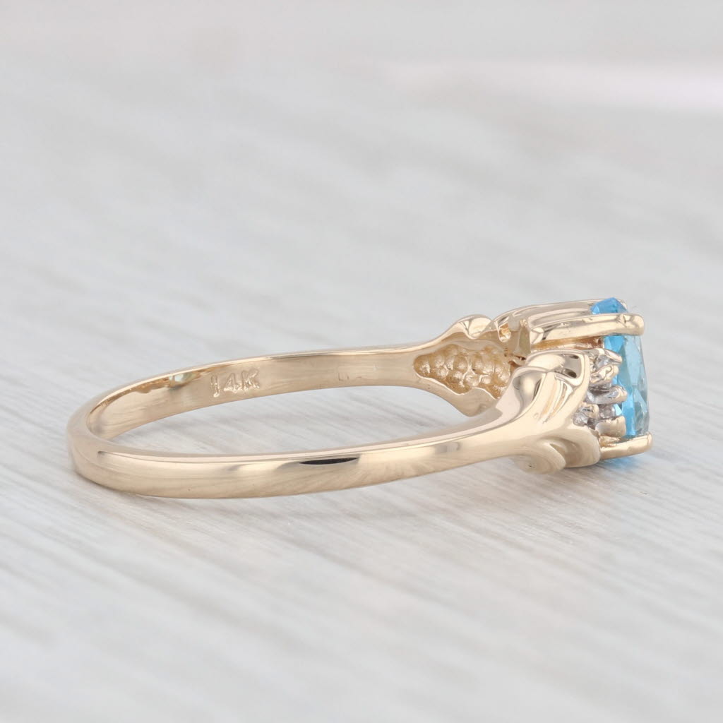 Light Gray 0.60ctw Oval Blue Topaz Diamond Ring 14k Yellow Gold Size 6.25