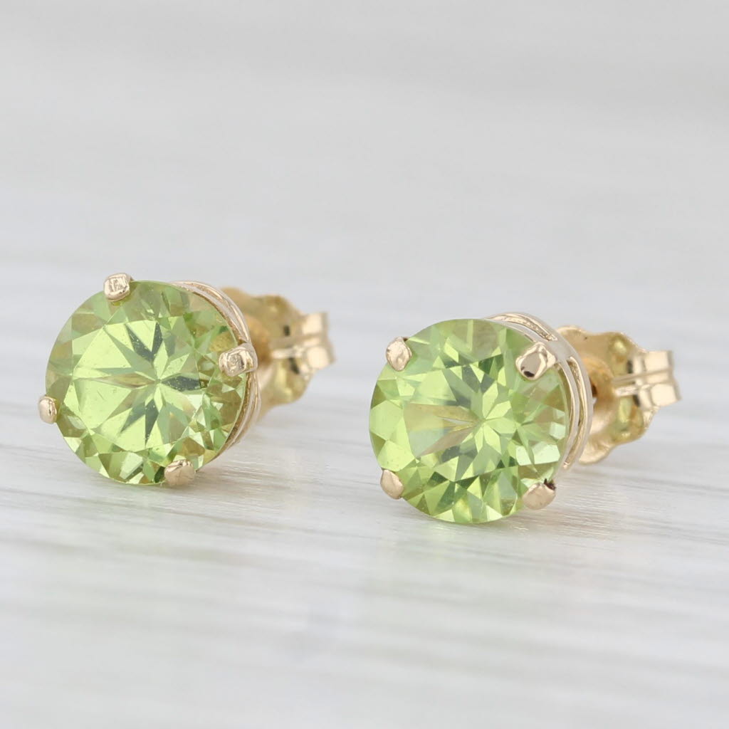 Light Gray 1.80ctw Round Solitaire Peridot Stud Earrings 14k Yellow Gold