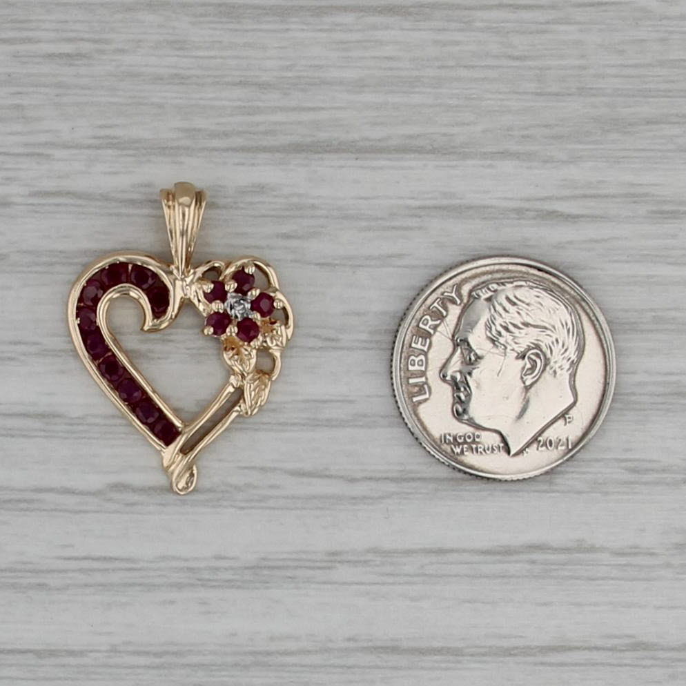 0.55ctw Ruby Flower Heart Pendant 10k Yellow Gold Diamond