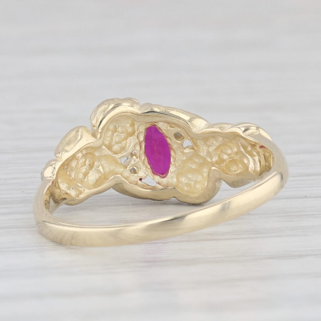 Light Gray 0.20ctw Lab Created Ruby Cherub Ring 10k Yellow Gold Diamond Accents Size 6.75