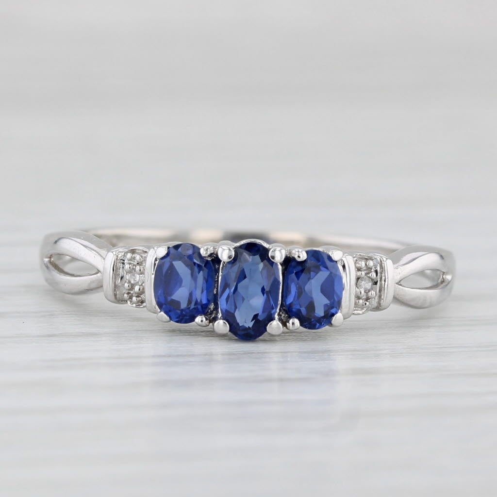 Light Gray 0.95ctw Lab Created Sapphire 3-Stone Ring 10k White Gold Size 9 Diamond Accents