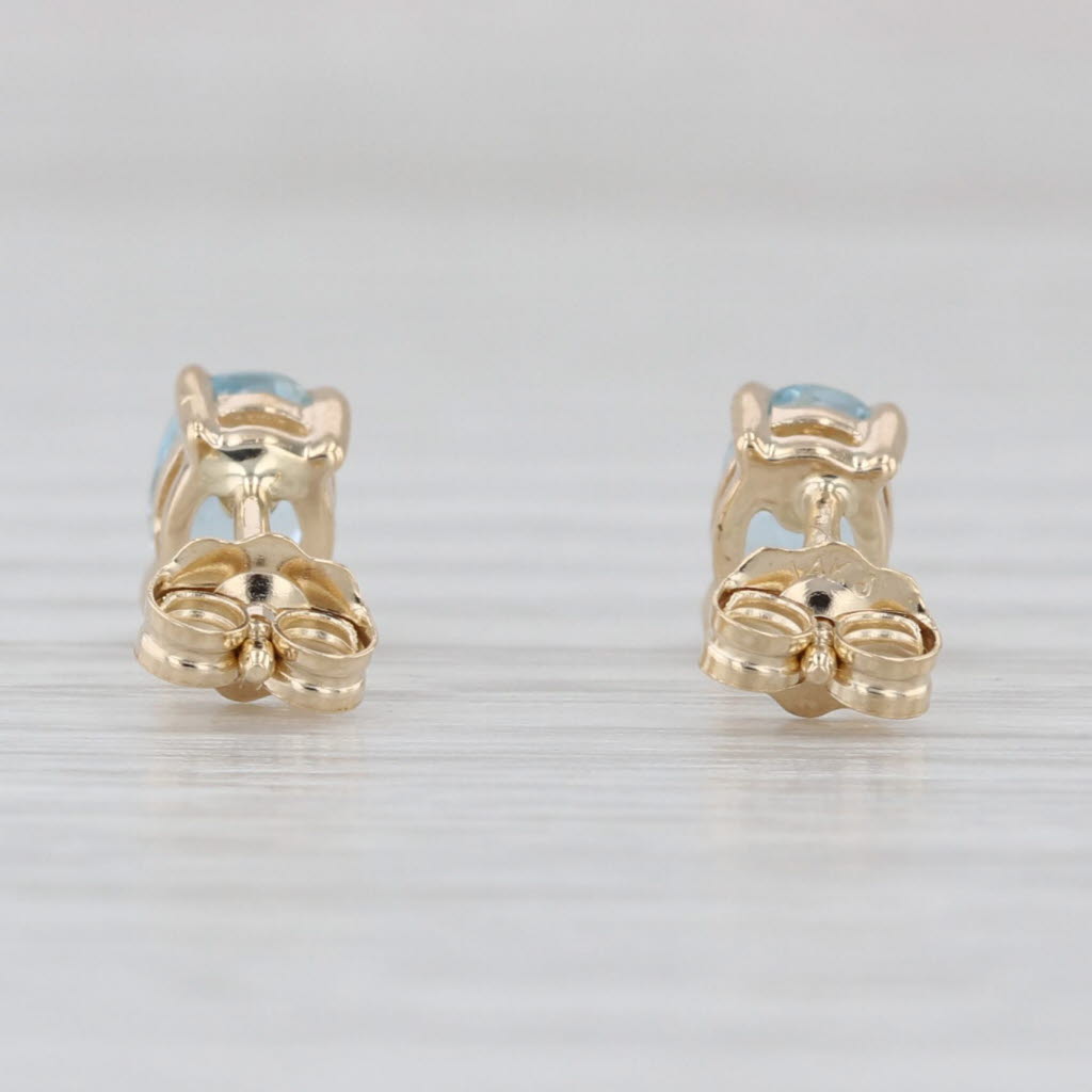 0.80ctw Oval Aquamrine Solitaire Stud Earrings 14k Yellow Gold Studs