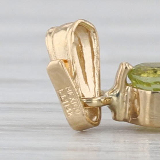 2.20ctw Peridot Amethyst Cross Pendant 14k Yellow Gold