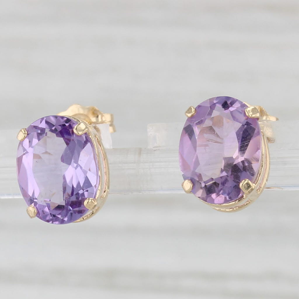 Light Gray 3.30ctw Oval Solitaire Amethyst Stud Earrings 14k Yellow Gold