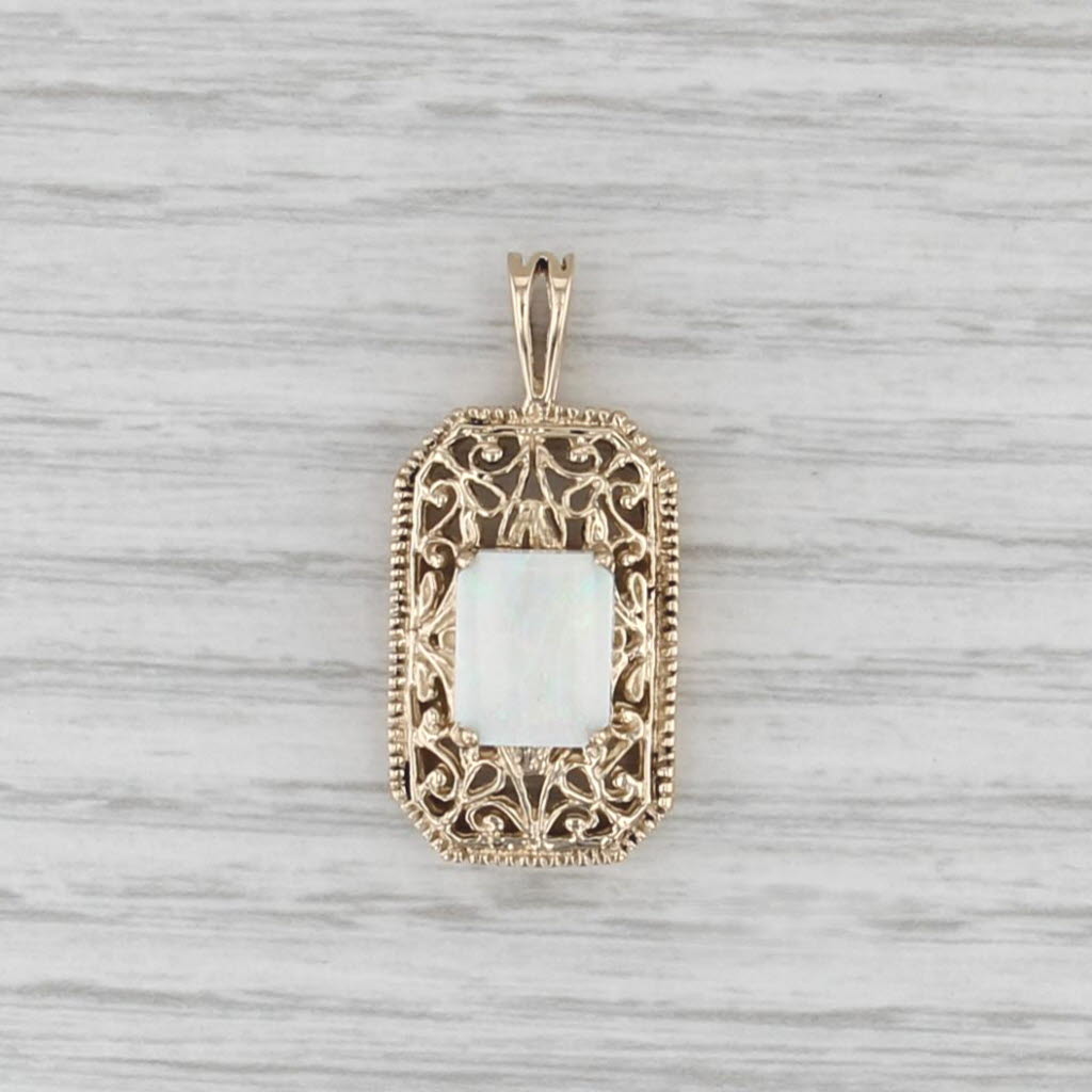 Ornate Openwork Opal Cabochon Pendant 10k Yellow Gold