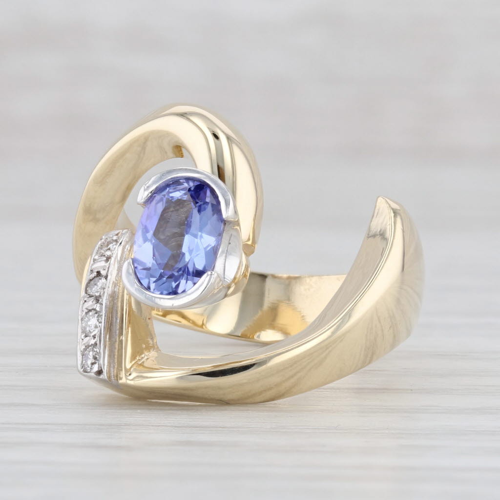 Light Gray 0.92ctw Oval Tanzanite Diamond Wrap Ring 14k Yellow Gold Size 7.5