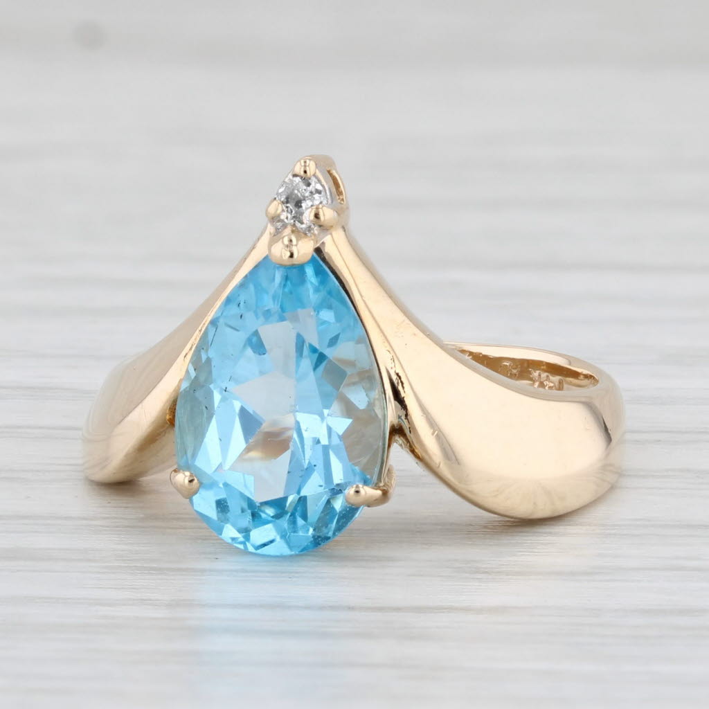 Light Gray 3.97ctw Pear Blue Topaz Diamond Ring 14k Yellow Gold Size 7.75