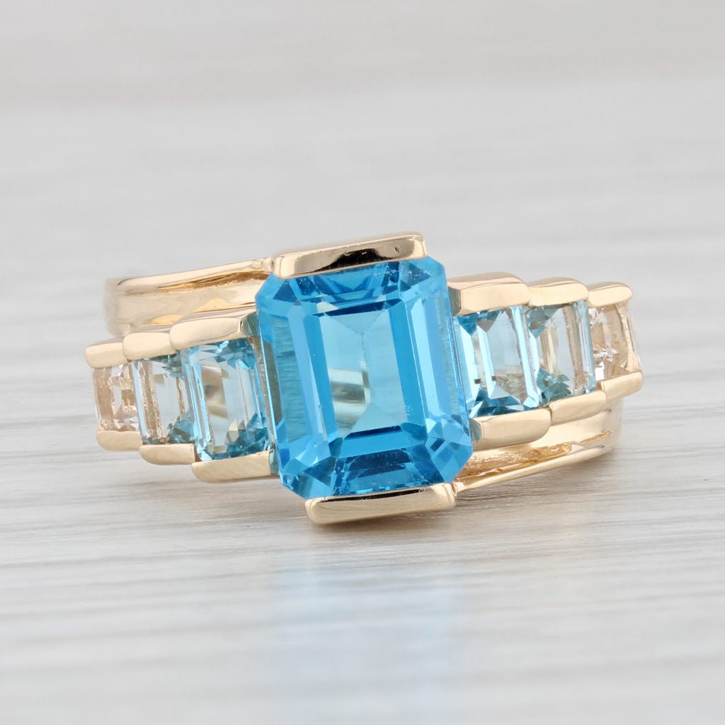 Light Gray 4.30ctw Blue White Tiered Topaz Ring 14k Yellow Gold Size 7