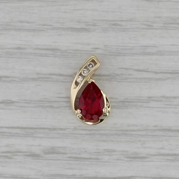 1.74ctw Pear Lab Created Ruby Diamond Teadrop Pendant 10k Yellow Gold