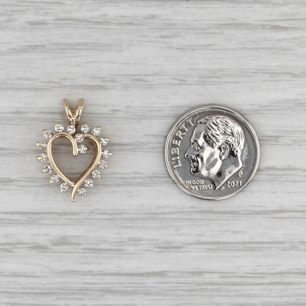 0.14ctw Diamond Framed Open Heart Pendant 10k Yellow Gold