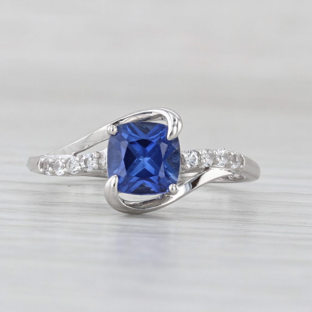 1.41ctw Lab Created Blue Sapphire White Topaz Ring 10k White Gold Size 7 Bypass