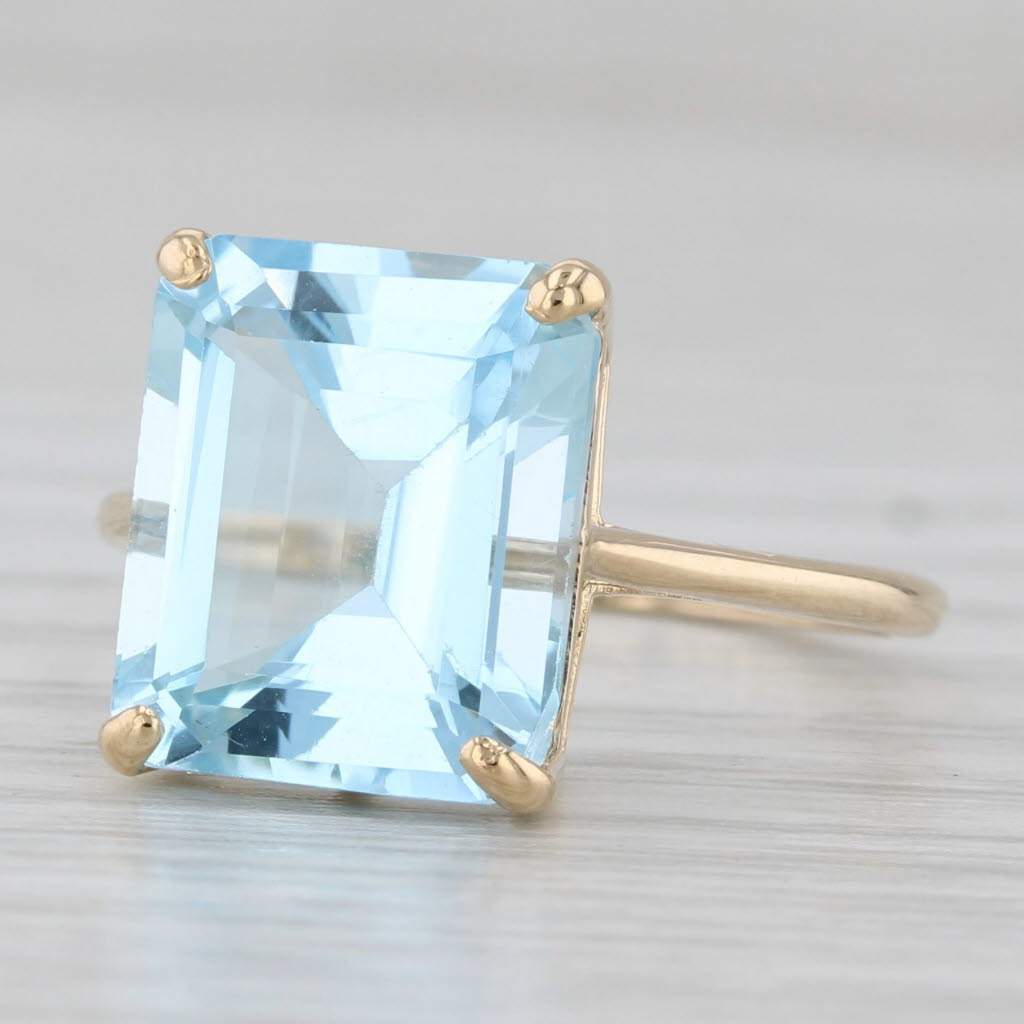 Light Gray 7.35ct Emerald Cut Blue Topaz Solitaire Ring 14k Yellow Gold Size 7