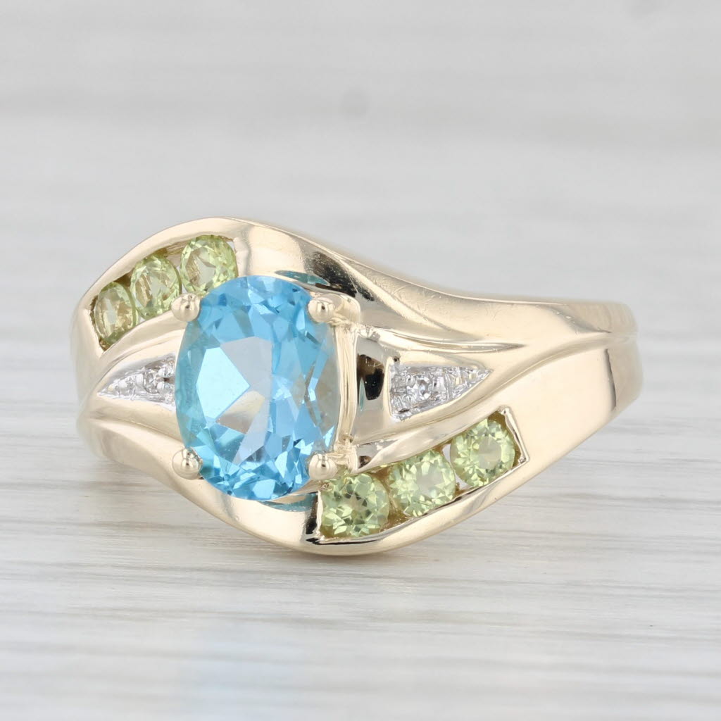 Light Gray 1.94ctw Oval Blue Topaz Peridot Diamond Ring 10k Yellow Gold Size 7.25