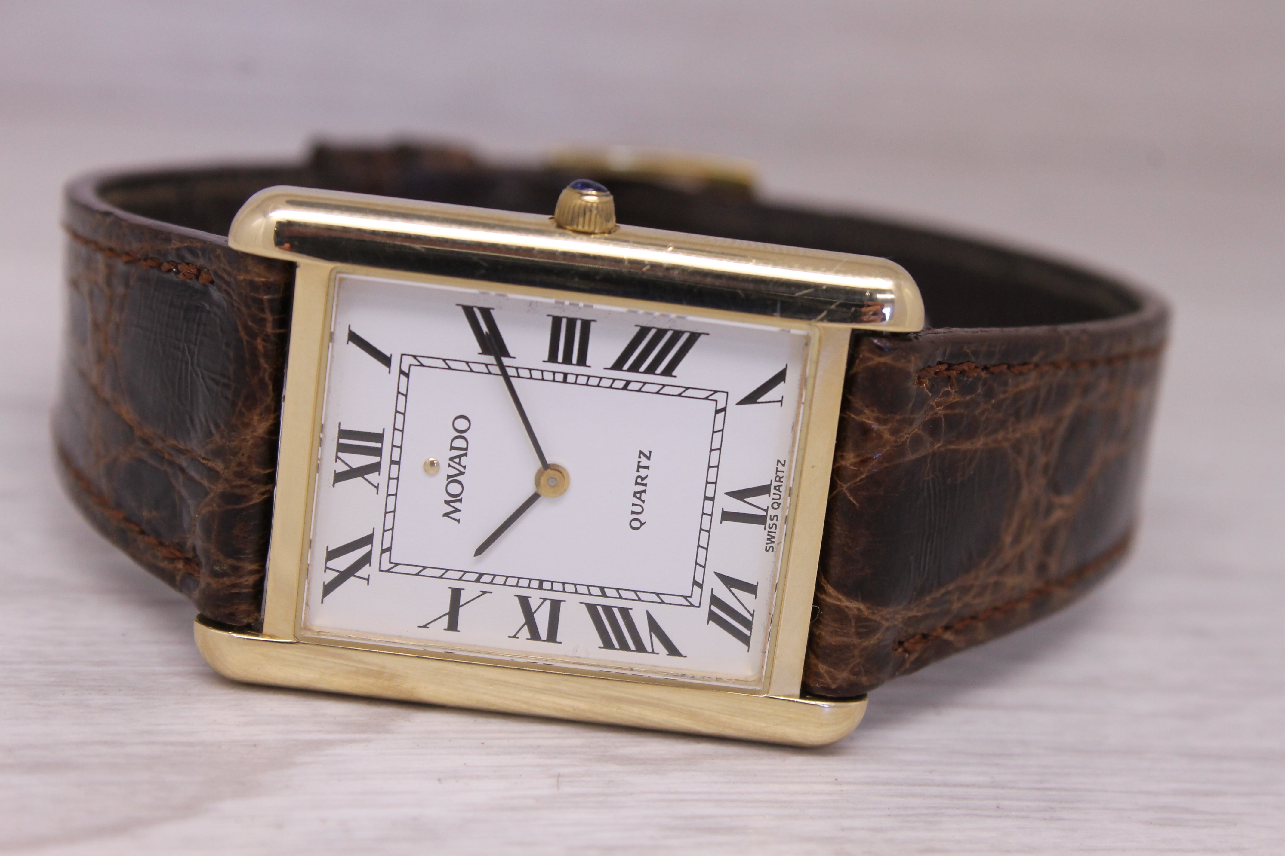 Vintage c.1990 Movado 14k Yellow Gold 25mm Tank Dress Watch Quartz Roman Dial
