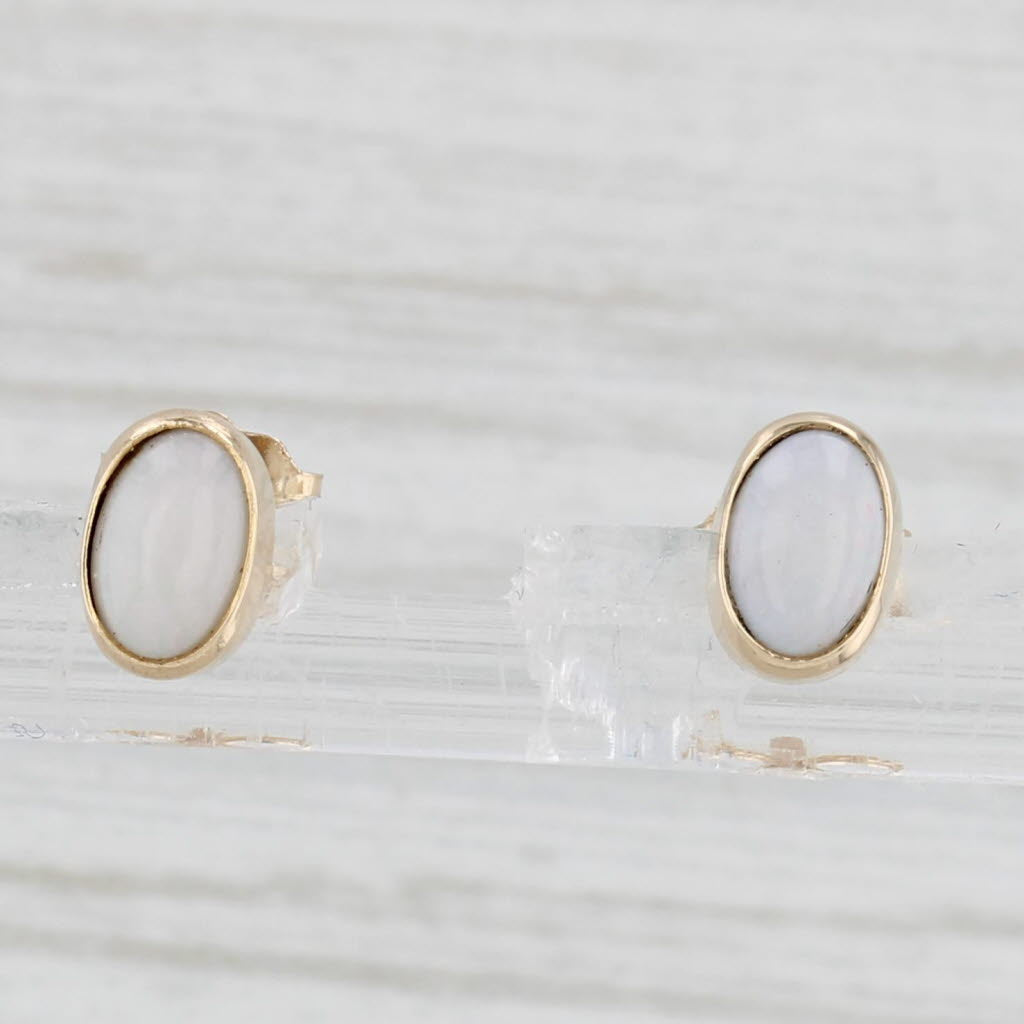 Light Gray Opal Oval Cabochon Stud Earrings 14k Yellow Gold