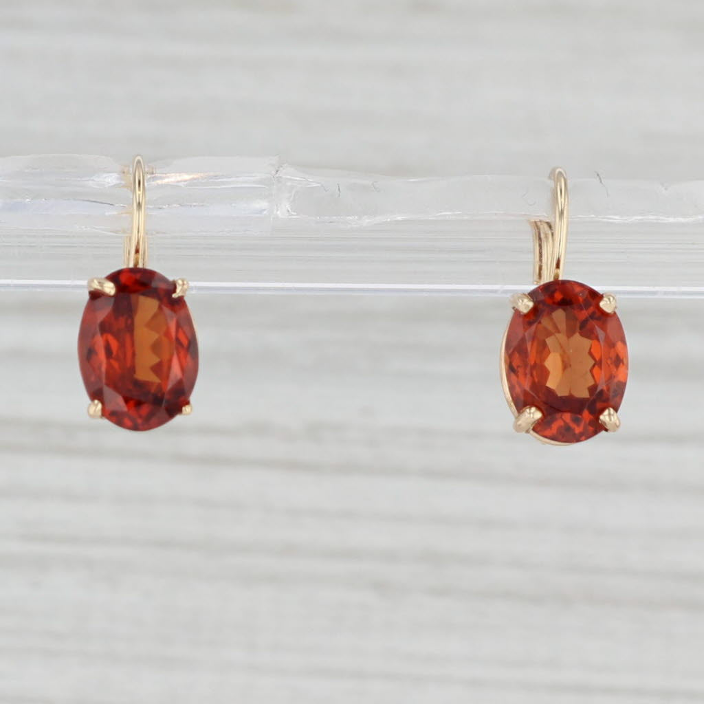 Light Gray 2.47ctw Oval Orange Malaia Garnet Drop Earrings 14k Yellow Gold Leverbacks