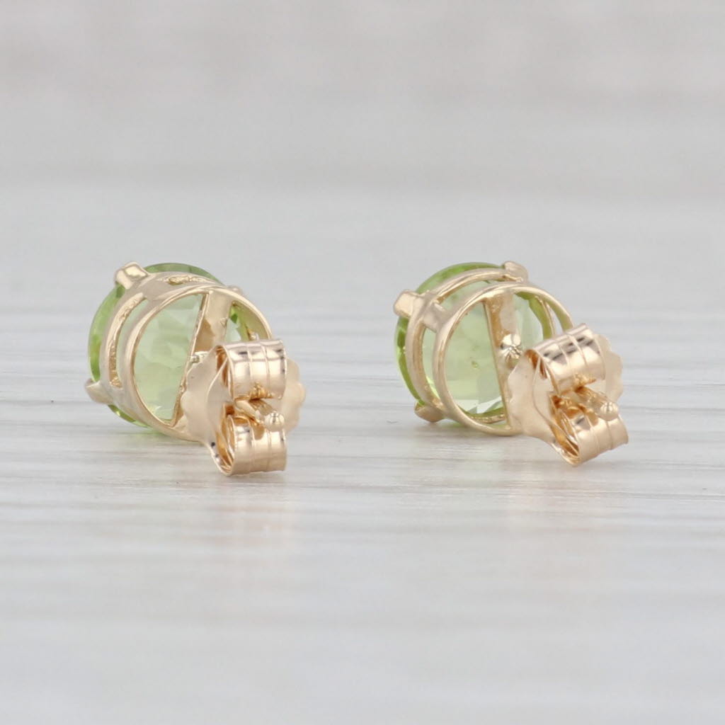 Light Gray 1.90ctw Round Peridot Stud Earrings 14k Yellow Gold August Birthstone