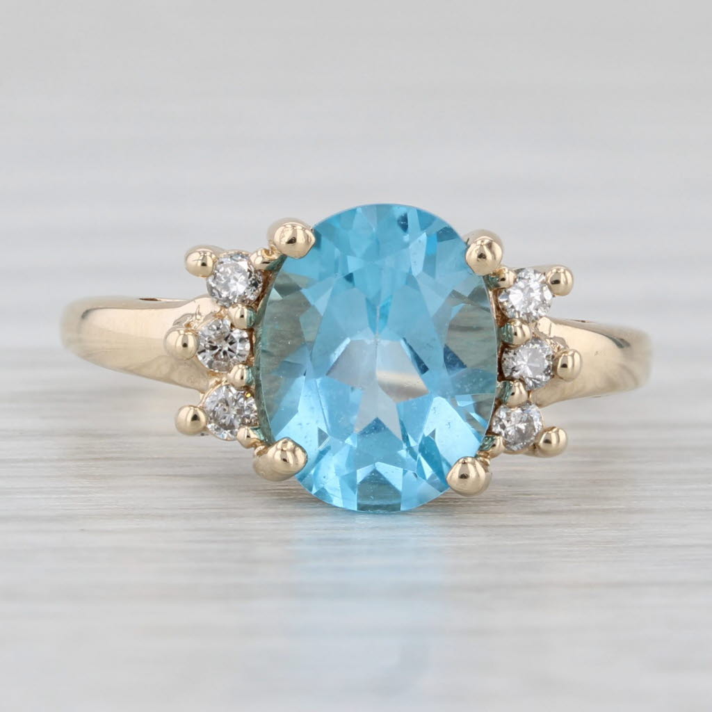 Light Gray 2.19ctw Oval Blue Topaz Diamond Ring 10k Yellow Gold Size 4.5