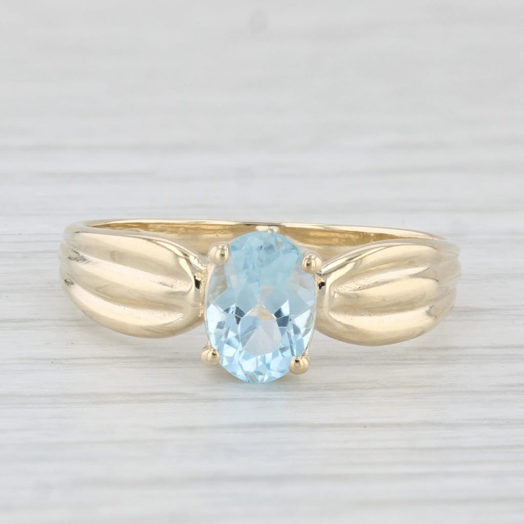 Light Gray 0.70ct Oval Blue Topaz Solitaire Ring 10k Yellow Gold Size 7.25