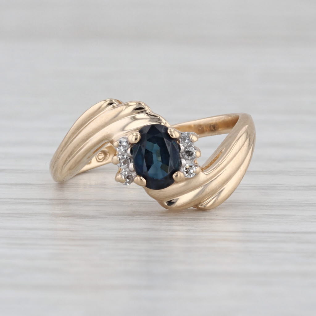 0.64ctw Oval Blue Sapphire Diamond Bypass Ring 14k Yellow Gold Size 6.5