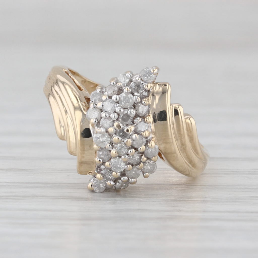 0.18ctw Diamond Cluster Bypass Ring 10k Yellow Gold Size 4.75