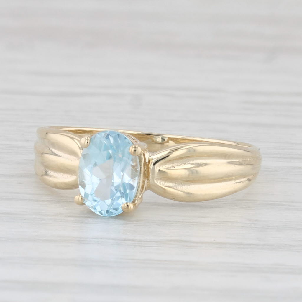 Light Gray 0.70ct Oval Blue Topaz Solitaire Ring 10k Yellow Gold Size 7.25