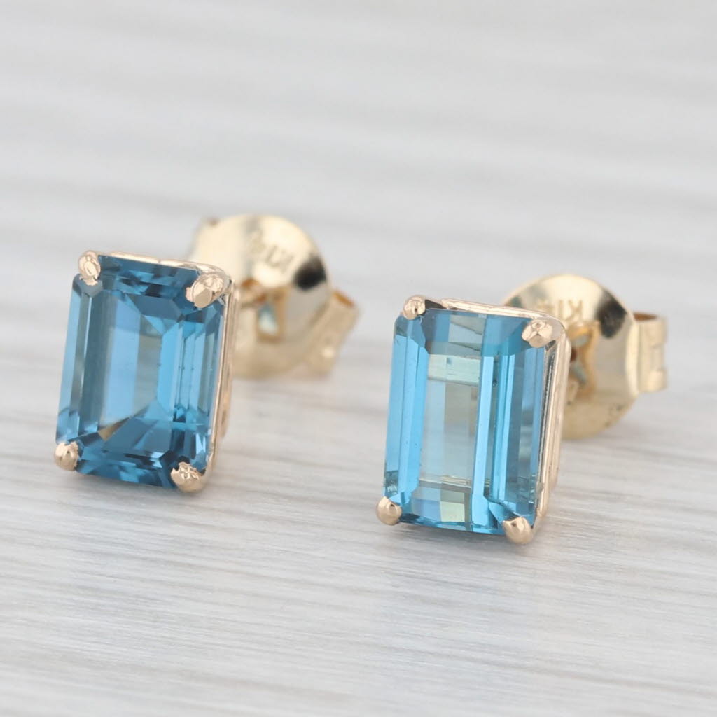 Light Gray 2.60ctw London Blue Topaz Stud Earrings 14k Yellow Gold Emerald Cut Solitaires