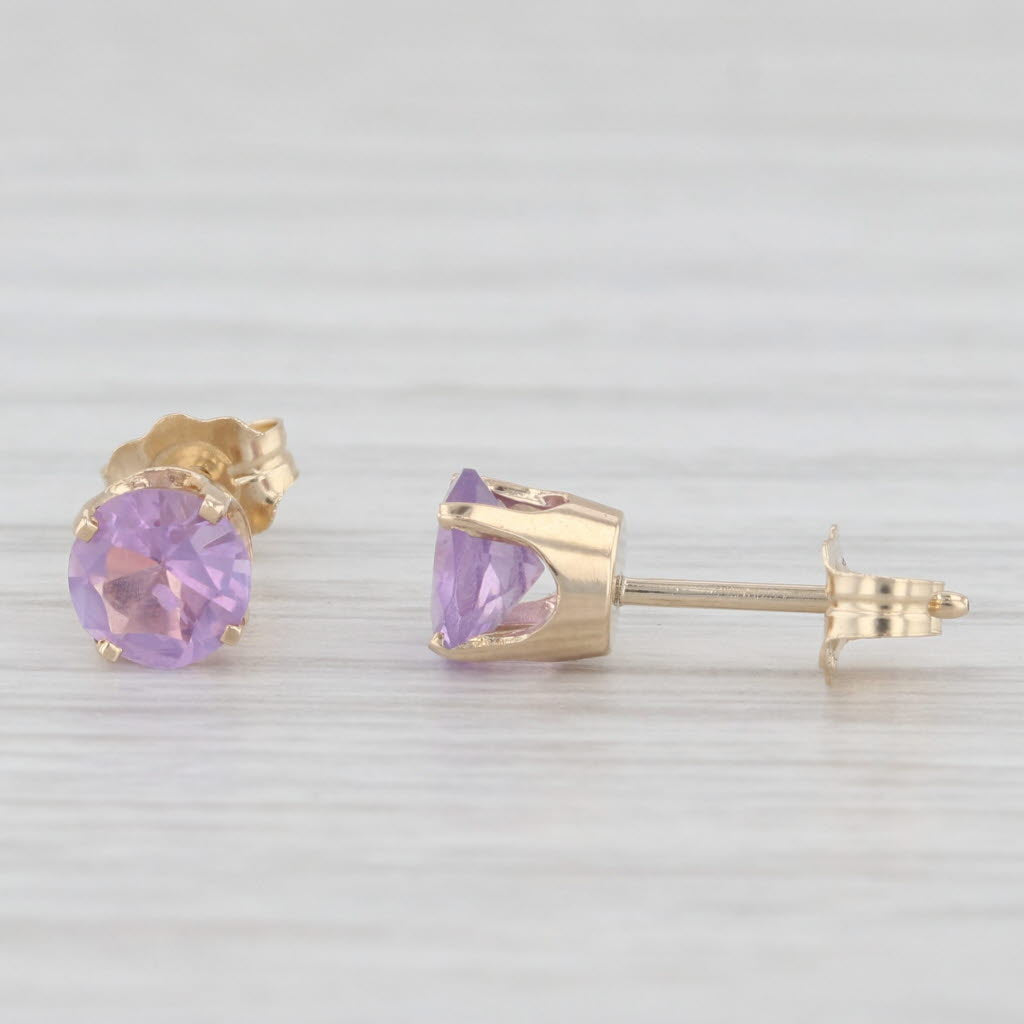 Light Gray 0.90ctw Round Amethyst Solitaire Stud Earrings 14k Yellow Gold