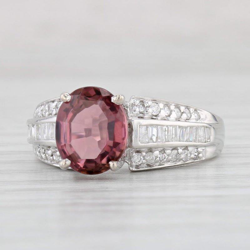 Oval Cut Fancy Pink Diamond Halo Engagement Ring 64567: buy online in NYC.  Best price at TRAXNYC.