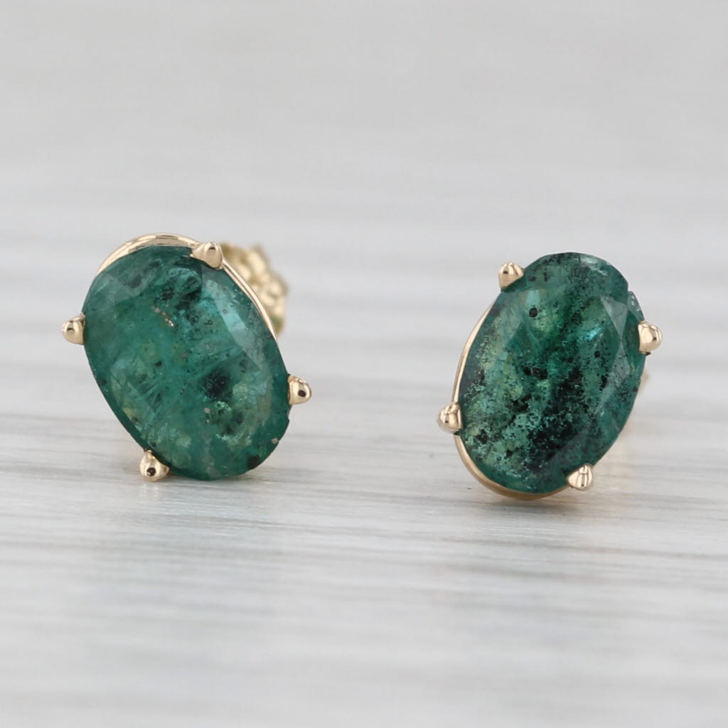 Light Gray 1.40ctw Oval Emerald Solitaire Stud Earrings 14k Yellow Gold