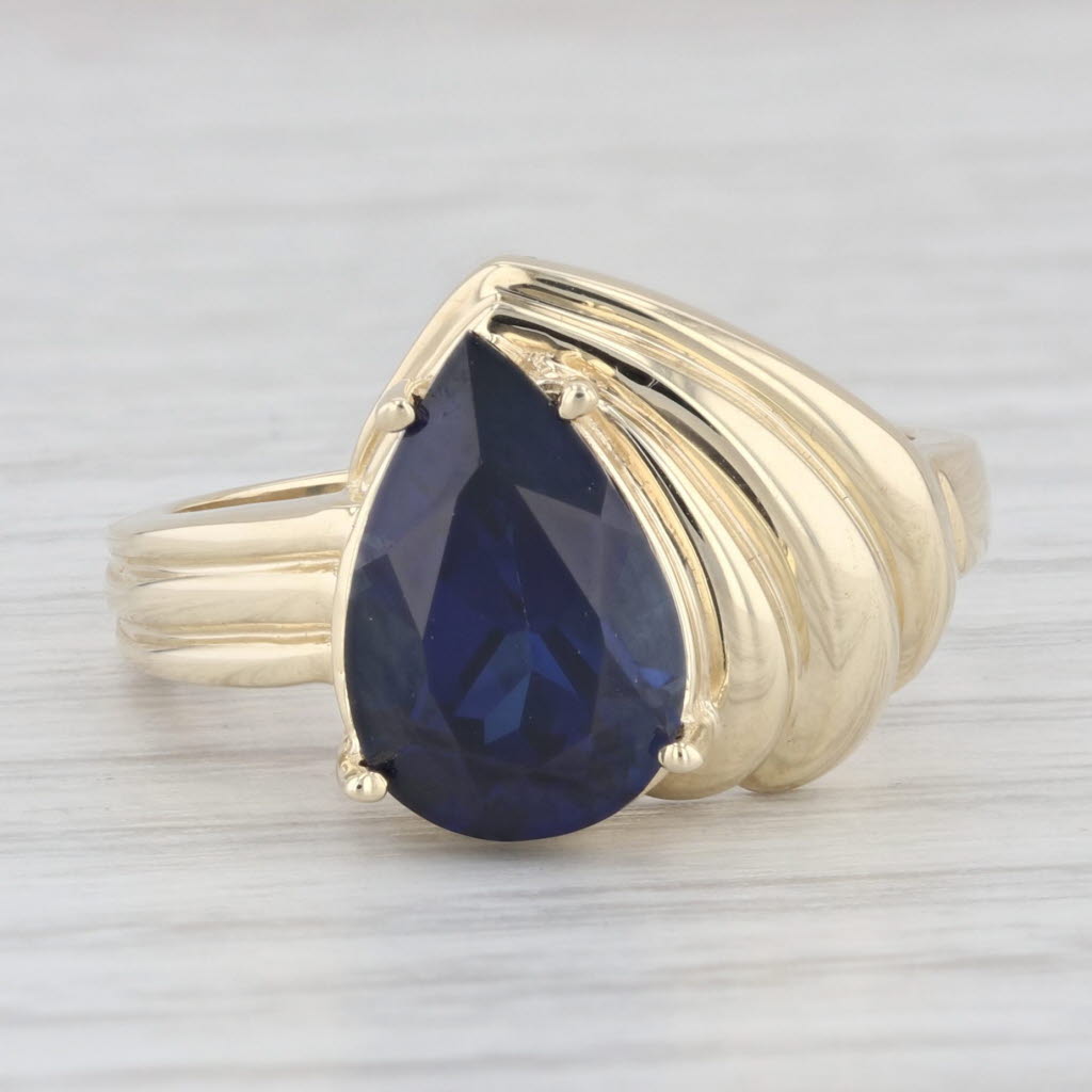 Light Gray 4.30ctw Lab Created Pear Blue Sapphire 10k Yellow Gold Size 8 Ring