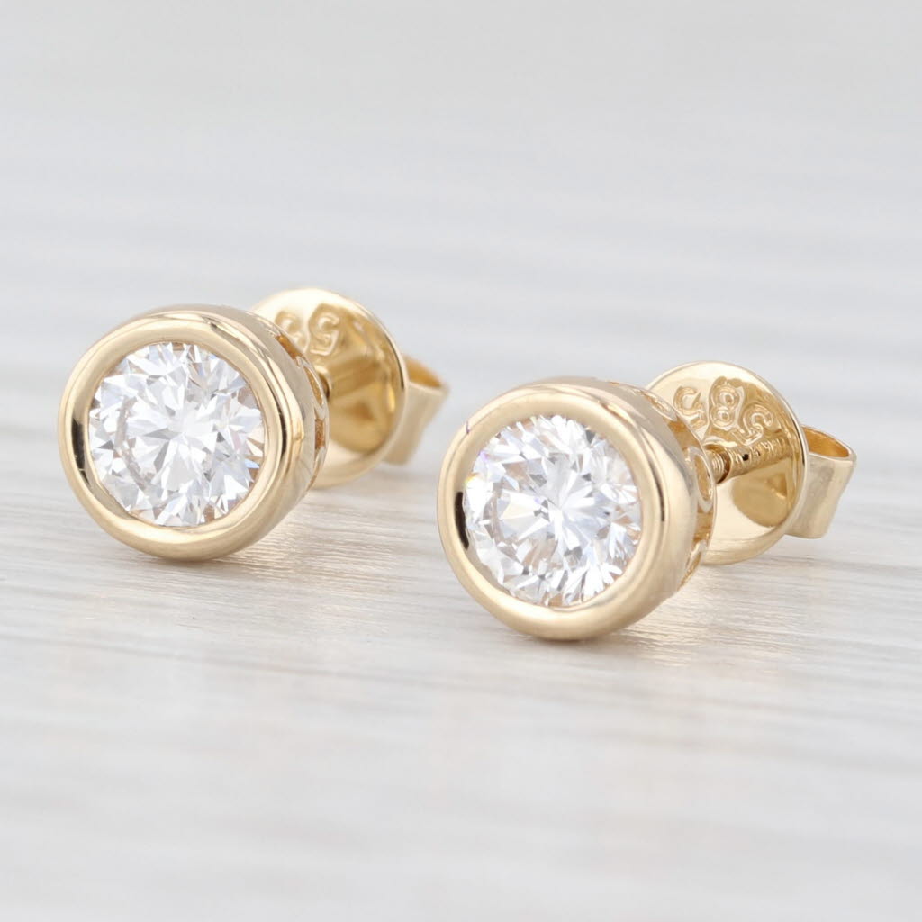 Light Gray New 0.56ctw Lab Grown Diamond Stud Earrings 14k Yellow Gold Round Solitaires