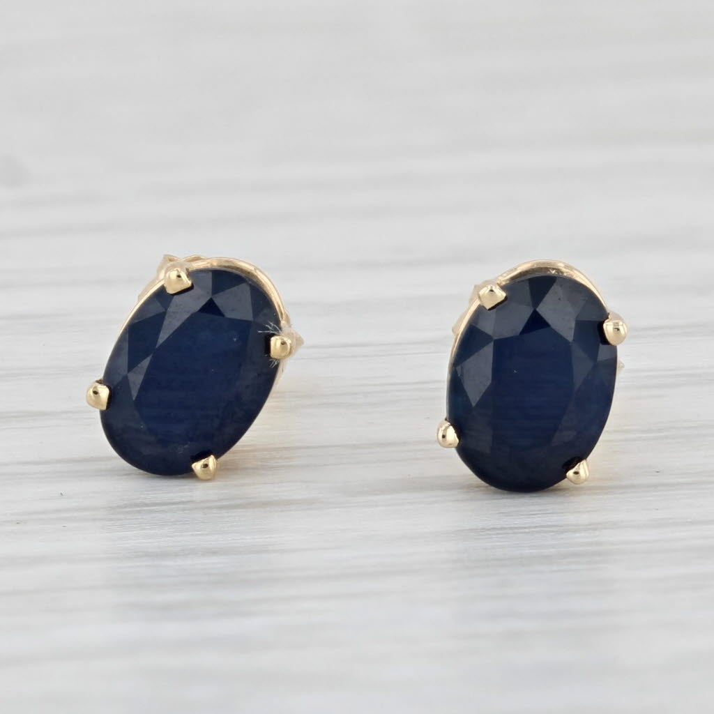 Light Gray 2ctw Blue Sapphire Stud Earrings 14k Yellow Gold Oval Solitaires