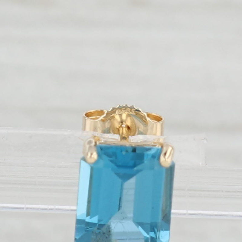 Light Gray 6ctw London Blue Topaz Solitaire Stud Earrings 14k Yellow Gold Emerald Cut Studs
