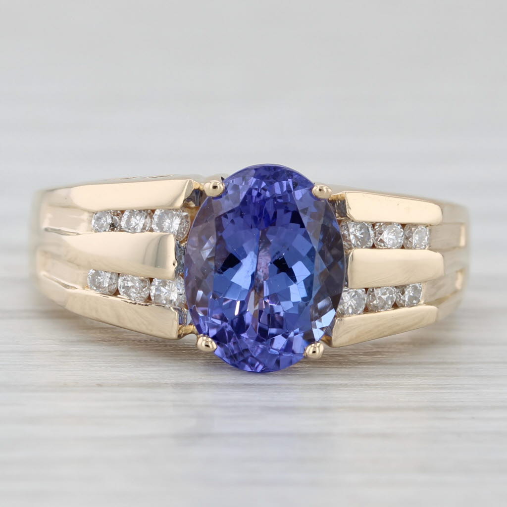 Light Gray 2.27ctw Oval Tanzanite Diamond Ring 14k Yellow Gold Size 6.25 Heart Accents