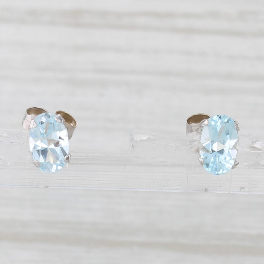 Light Gray 1.10ctw Oval Blue Topaz Solitaire Stud Earrings 14k White Gold