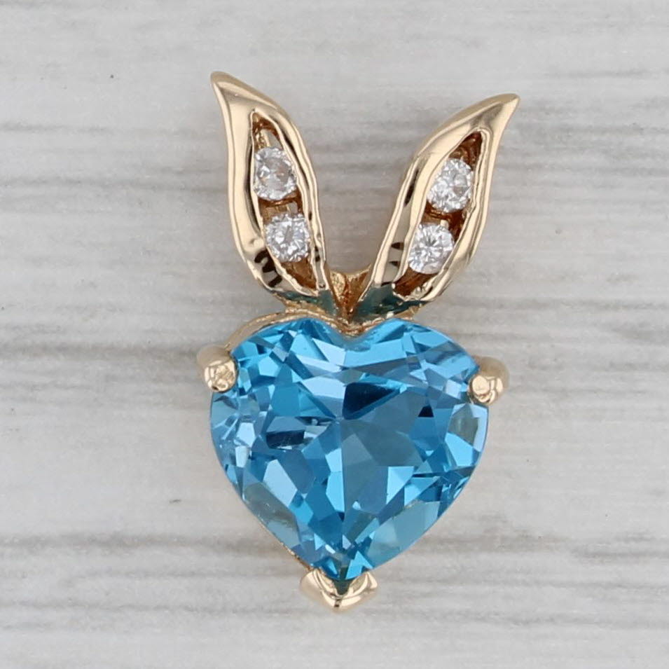 Gray 2.38ctw Blue Topaz Heart Diamond Pendant 14k Yellow Gold