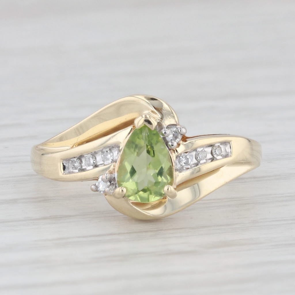 Light Gray 0.79ctw Pear Peridot Diamond Bypass Ring 10k Yellow Gold Size 7