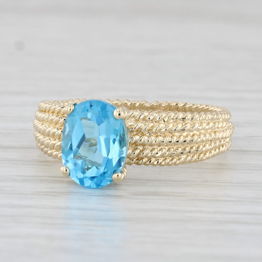 Light Gray 2.40ctw Oval Blue Topaz Solitaire Ring 14k Yellow Gold Size 8