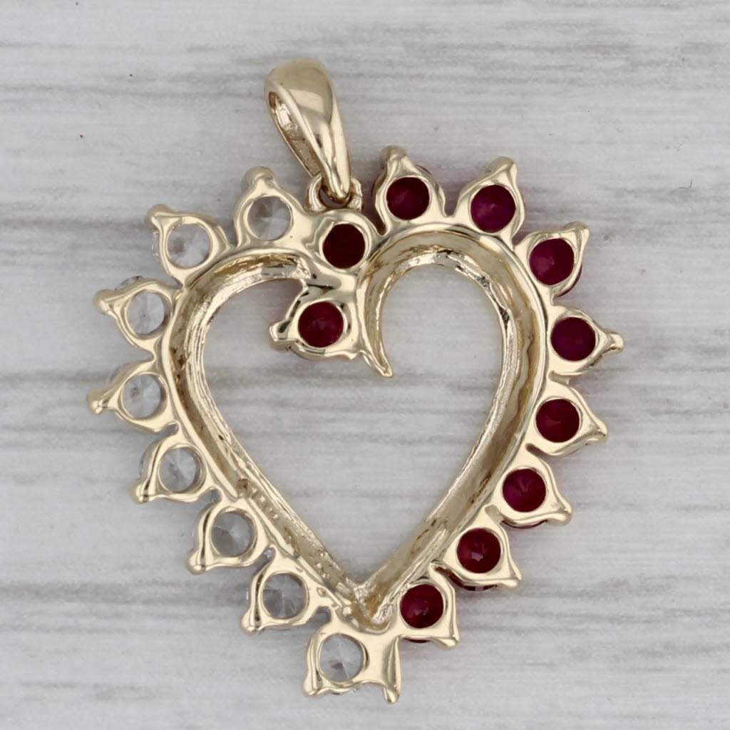 Gray 1.14ctw Lab Created Ruby White Topaz Open Heart Pendant 10k Yellow Gold