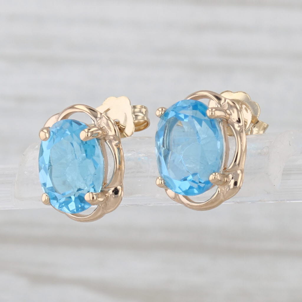 3.18ctw Blue Topaz Stud Earrings 14k Yellow Gold Solitaire Studs